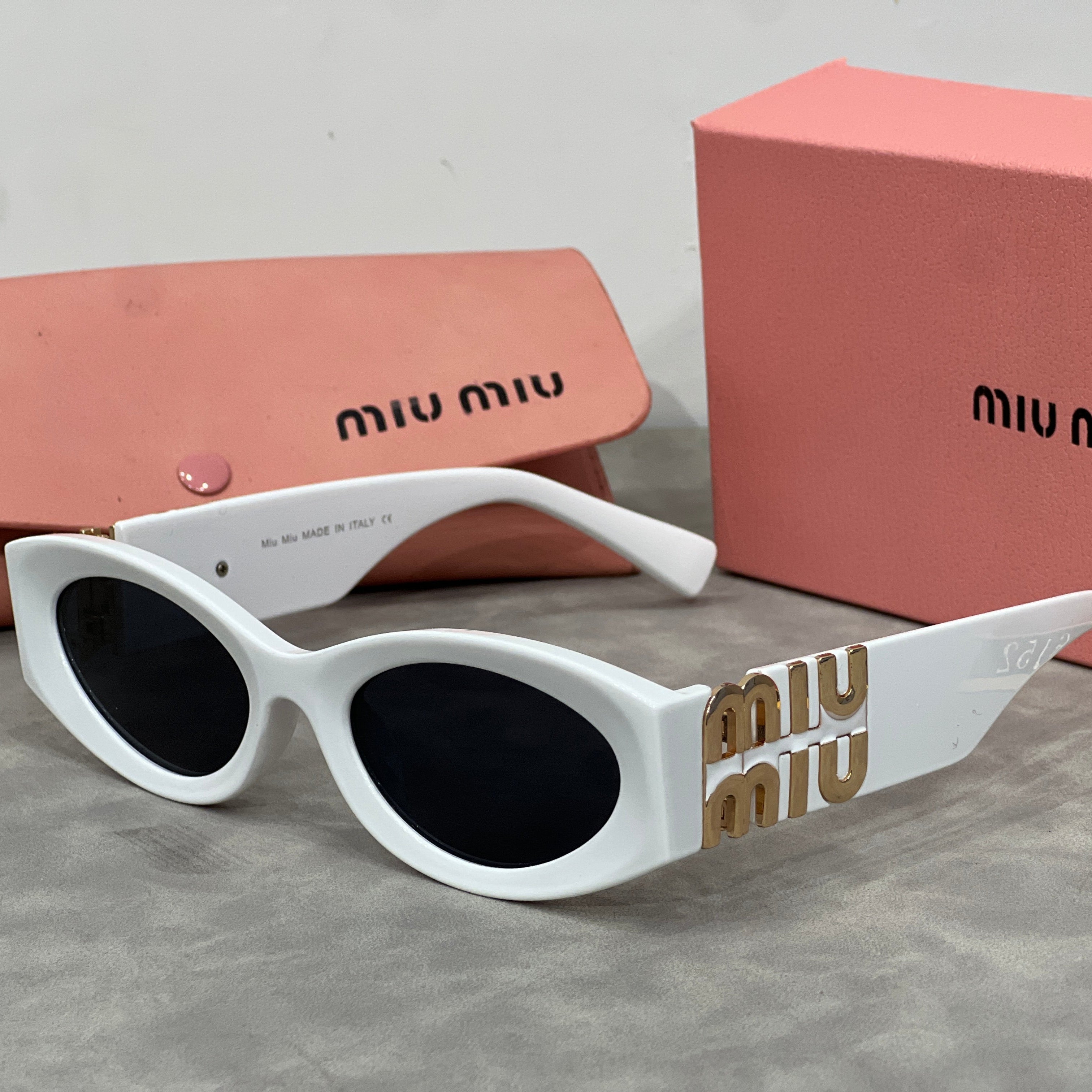 Miu Miu Cat Eye Sunglasses with Logo